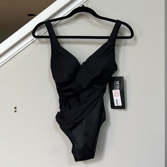 Miraclesuit
Rock Solid Revele Underwire Shaping One Piece Swimsuit. - Picture 4 of 11